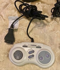 2 Vtg Gaming Controllers Performance ProPad, Gravis Game Pad, 2 Gaming Plug Ins