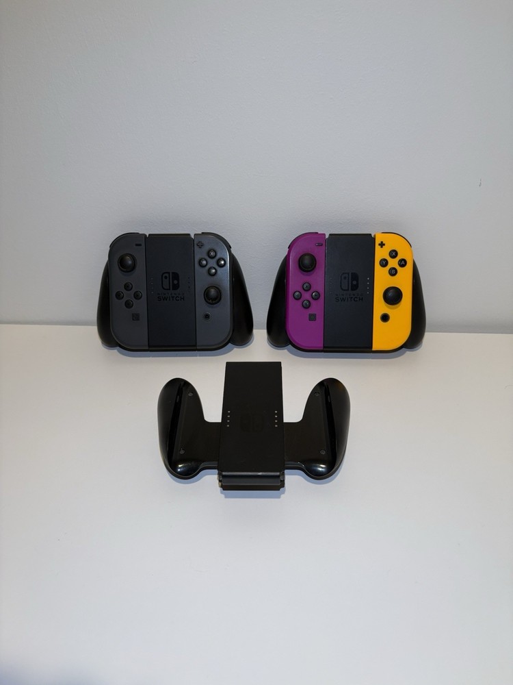 Nintendo Switch Joy-Con Controller Lot Of 2, Purple/Yellow And Black With Grips