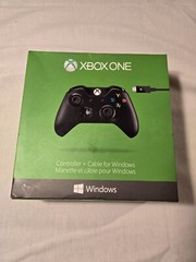 xbox one wireless controller black in color, used with cable